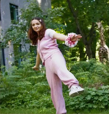 Alice playing outdoors